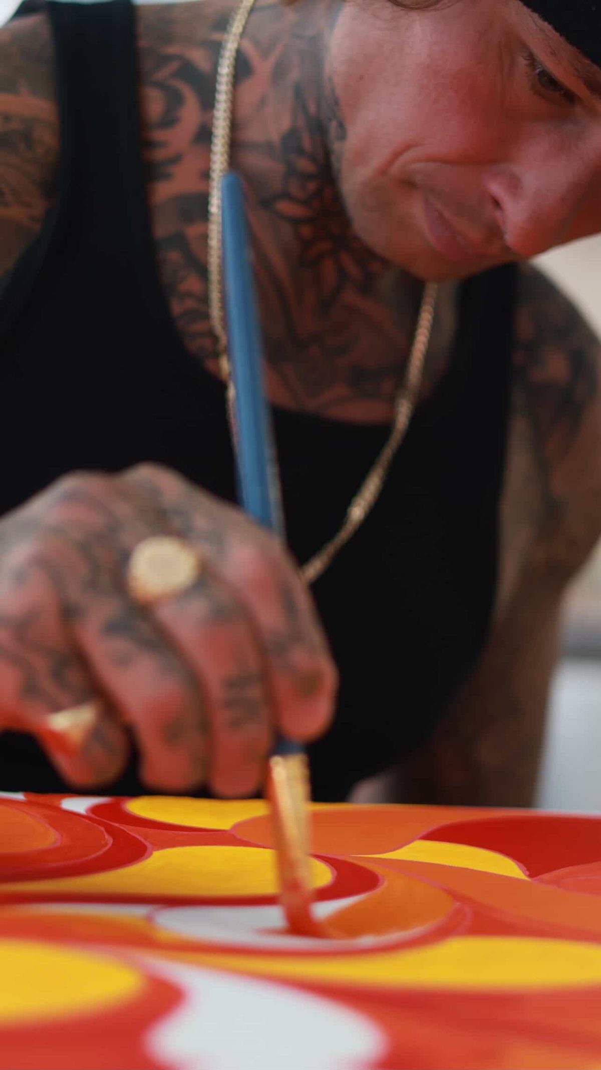 Josh Marx painting in his studio