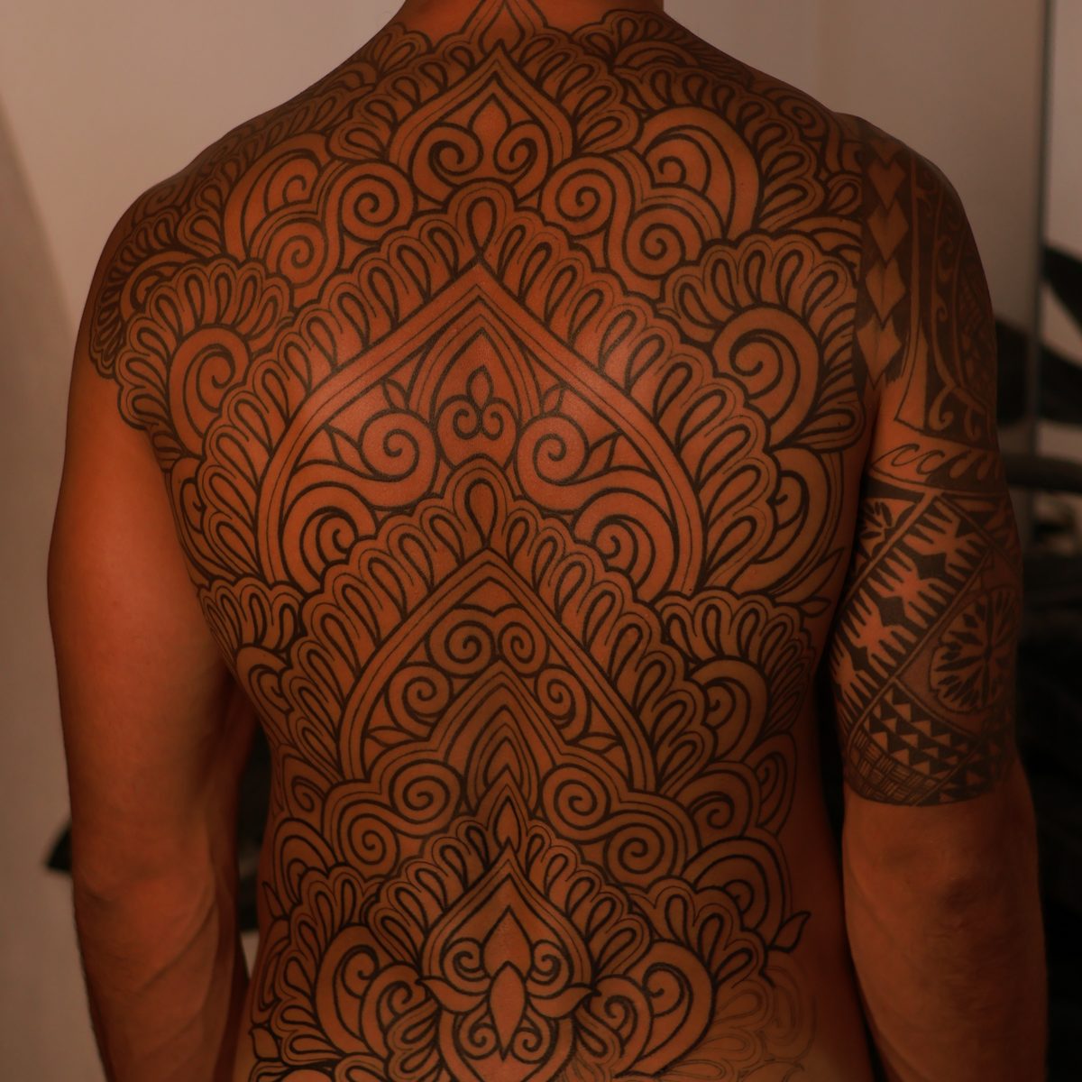 Fine line ornamental tattoo by Josh Marx