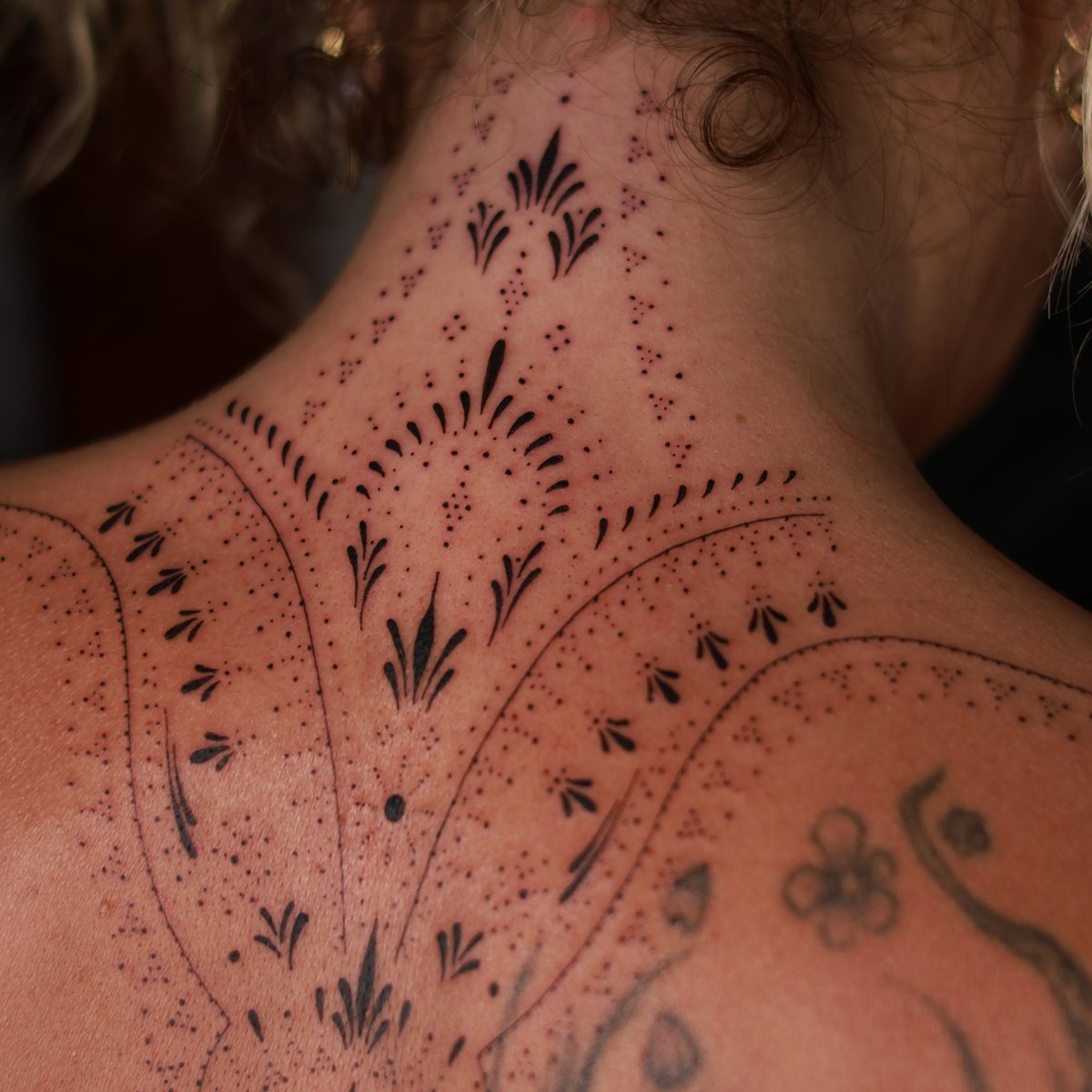 Bold linework ornamental tattoo by Josh Marx