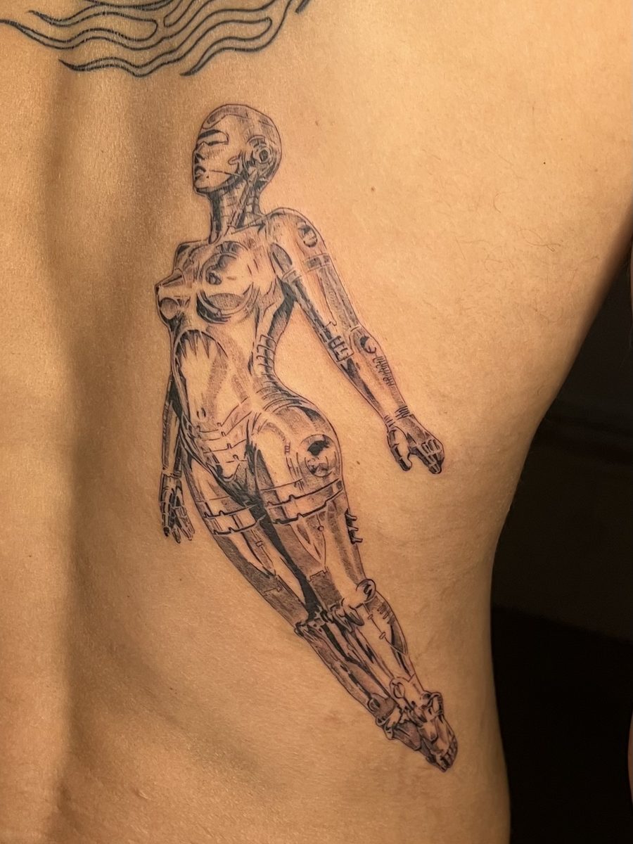 Tattoo by Konrad Tomimura