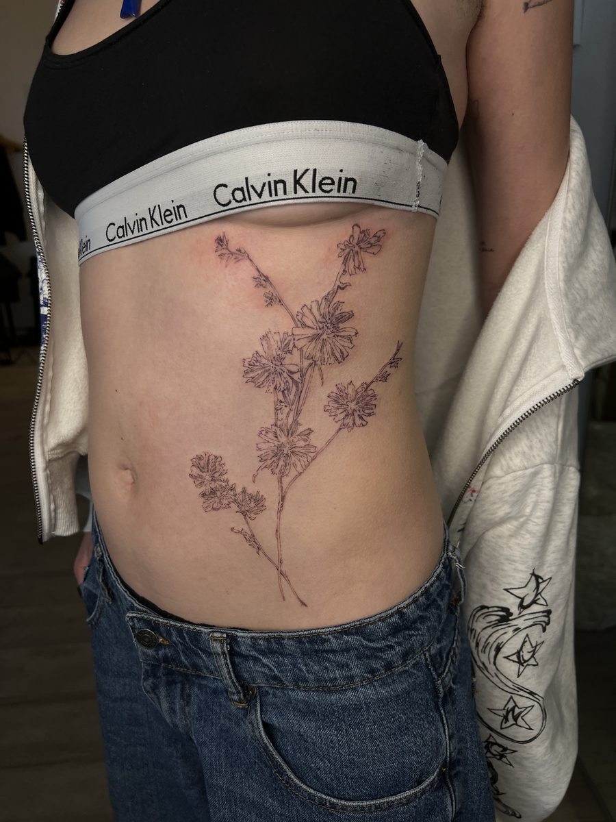 Tattoo by Konrad Tomimura