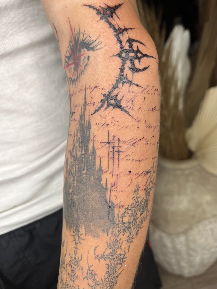 Tattoo by Konrad Tomimura