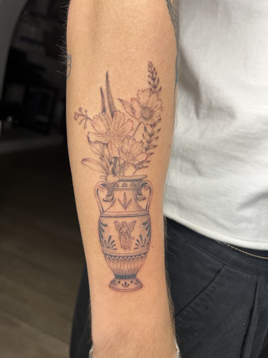 Tattoo by Konrad Tomimura